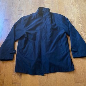 Black men’s jacket. It says it’s a XXXXL but fits more like a XL